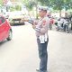 Personel Satlantas Polres Minahasa mengatur lalu lintas di sekitar Stadion Maesa Tondano saat HAPSA WKI GMIM 2025