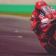 Marc Marquez merayakan kemenangan Sprint Race MotoGP Assen 2025 di atas podium bersama Alex Marquez dan Marco Bezzecchi.