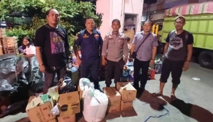 Polsek Pelabuhan Manado Gagalkan Penyelundupan 162,5 Liter Cap Tikus yang Disamarkan dalam Dus Makanan