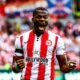 Dango Ouattara merayakan gol debutnya yang memastikan Brentford menang 1-0 atas Aston Villa di Gtech Community Stadium.