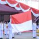 Murid Papua dari program ADEM tampil sebagai Paskibra di HUT ke-80 RI, mengibarkan bendera dan menunjukkan semangat persatuan.