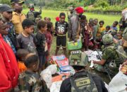 Yonif 712 Hadir Memberikan Rasa Aman Bagi Masyarakat Papua