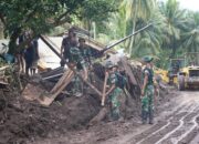 Personil Kodam Merdeka Buka Akses Jalan di Paseng Bersama Pemda dan Warga