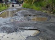 Setahun Kandoli-Tuda Memimpin Mitra, Jalan Rusak Justru Menganga di Dekat Rumah Bupati
