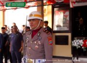 Kapolsek Sangtombolang Billygrehem Polii Jadi Sorotan dalam Prosesi Sakral Pemindahan Bendera Merah Putih